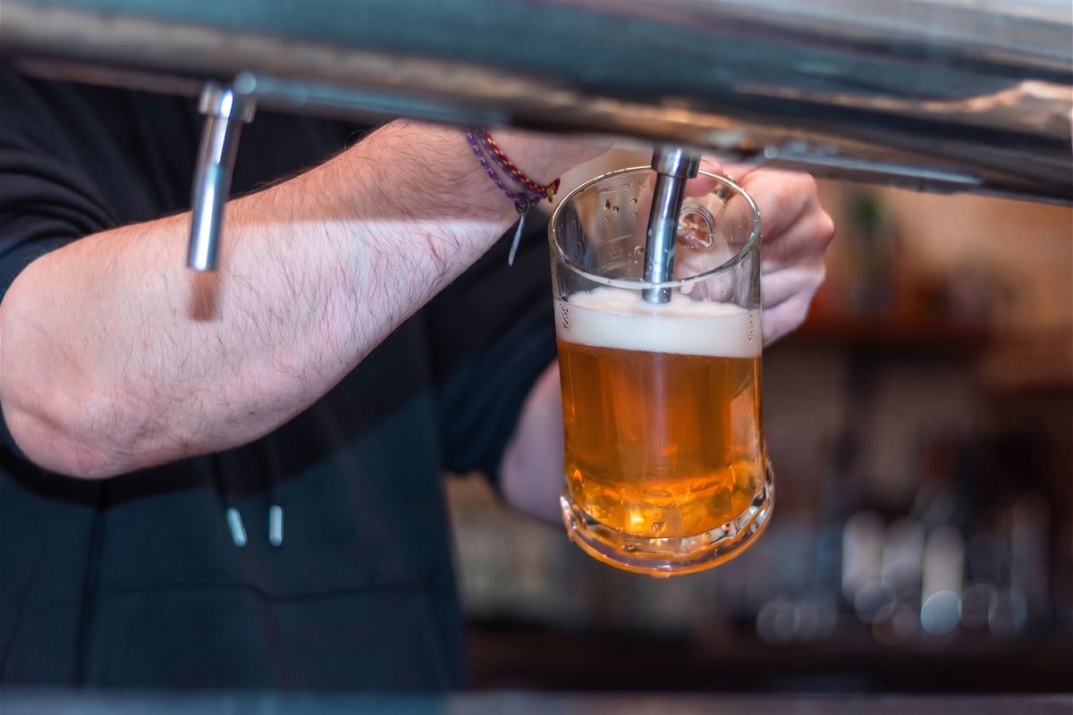 Craft beer being poured into a mug
